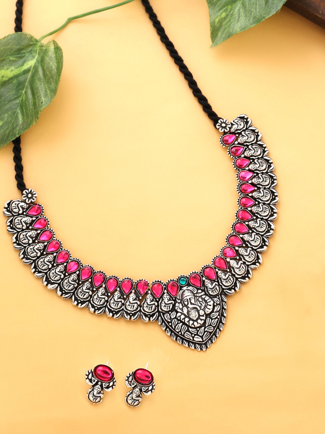

Yellow Chimes Pink Oxidised Silver-Plated Stone-Studded Maharashtrian Jewellery Set