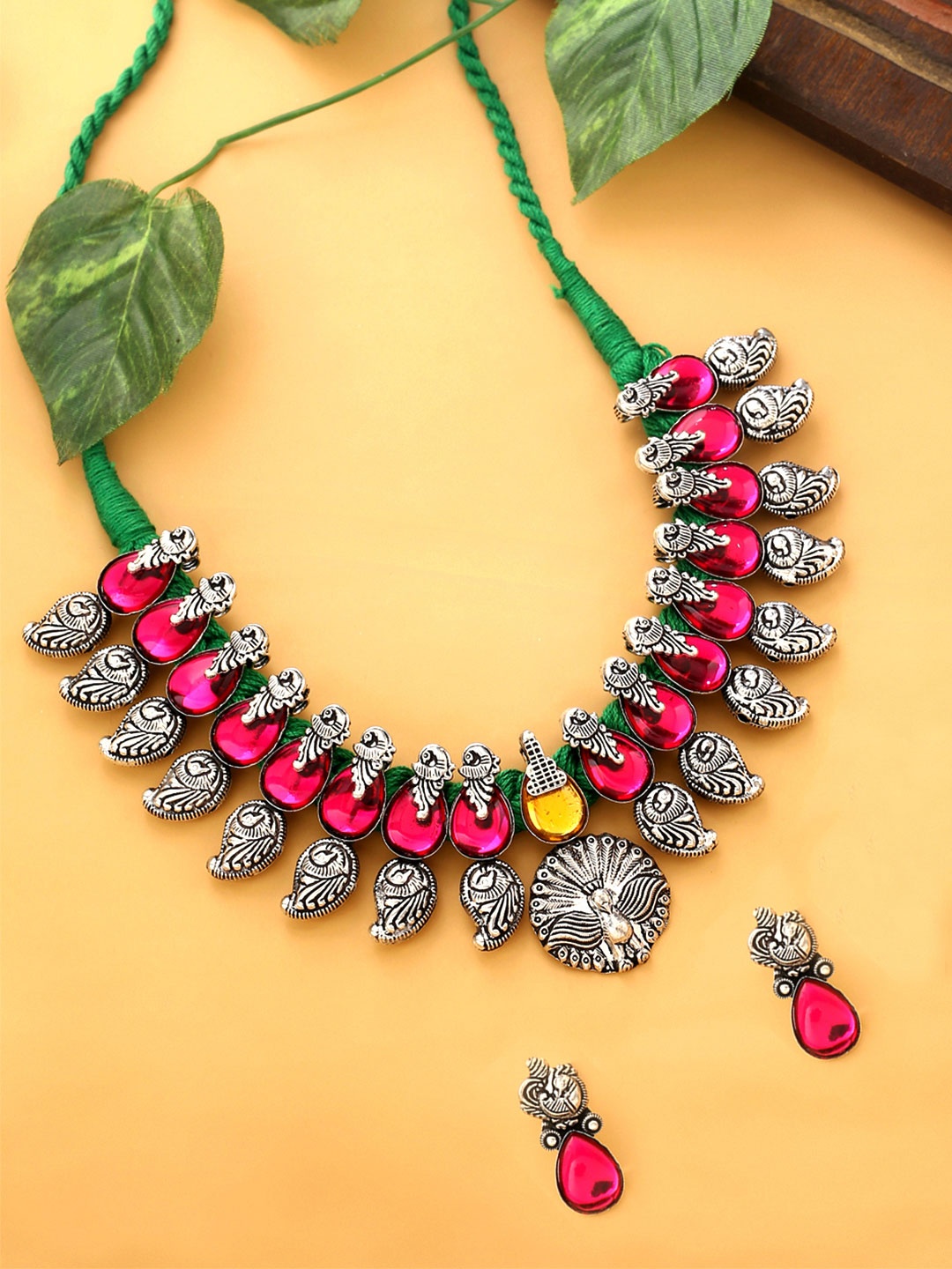 

Yellow Chimes Pink Oxidised Silver-Plated Stone-Studded Beaded Antique Jewellery Set