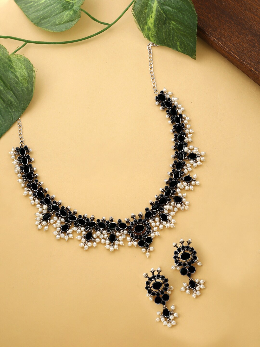 

Yellow Chimes Oxidised Silver-Plated White & Black Stone-Studded Beaded Jewellery Set