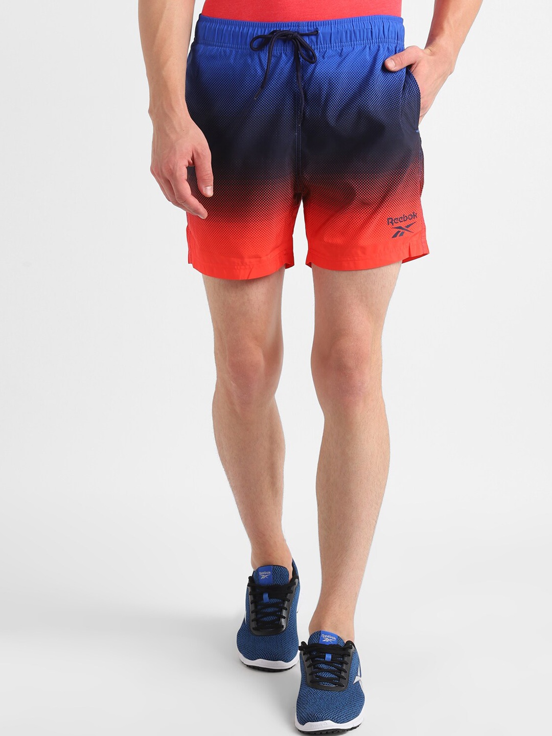 

Reebok Men Blue & Red Colourblocked Swim Shorts