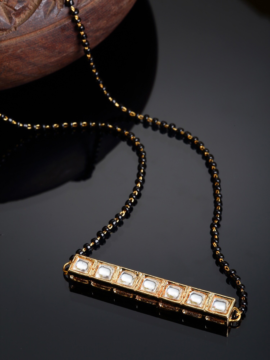 

KARATCART Gold-Plated Black & White Kundan-Studded & Beaded Mangalsutra