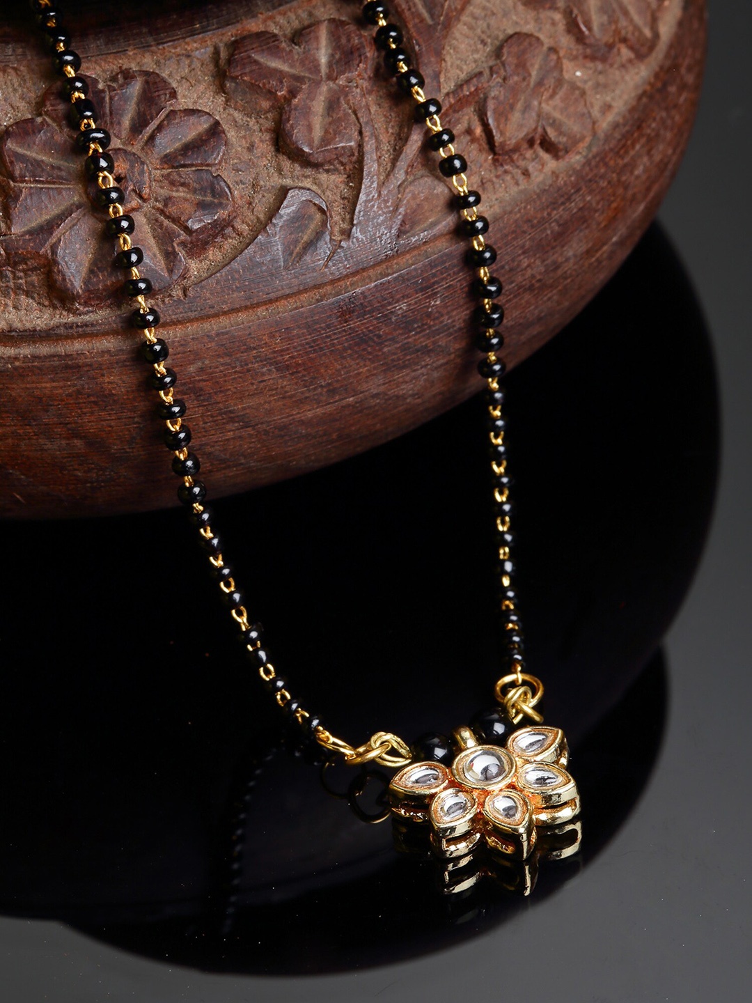 

KARATCART Gold-Plated Black & White Kundan-Studded & Beaded Mangalsutra