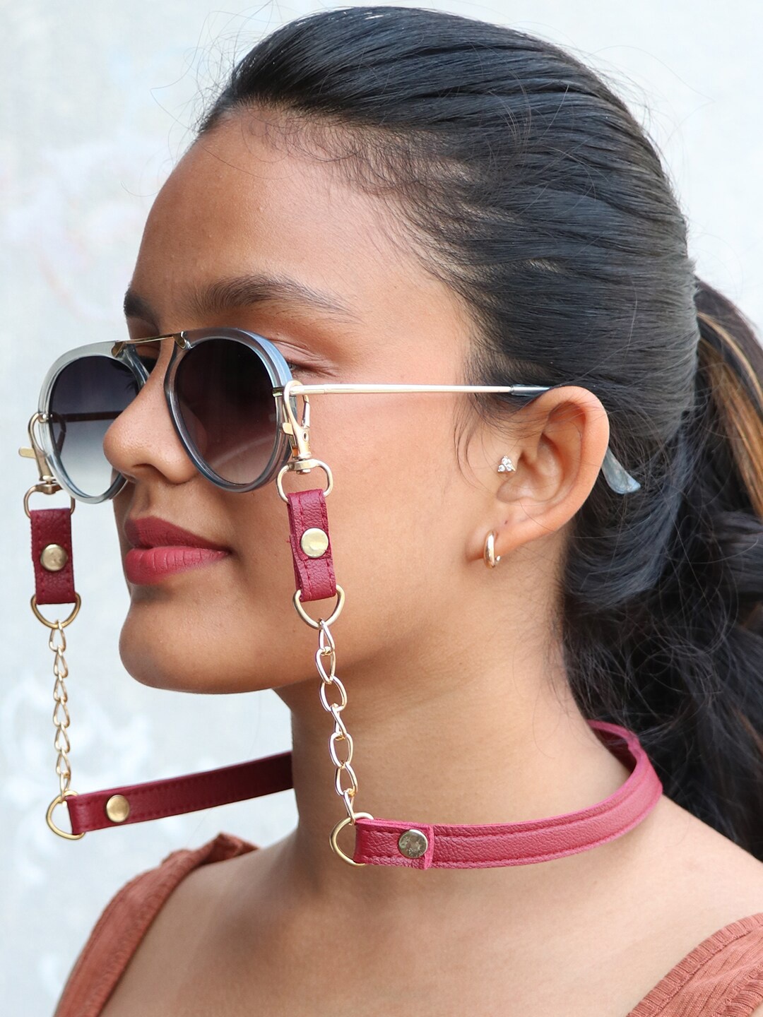 

Ayesha Woman Maroon Leather Mask Chain or Sunglass Chain