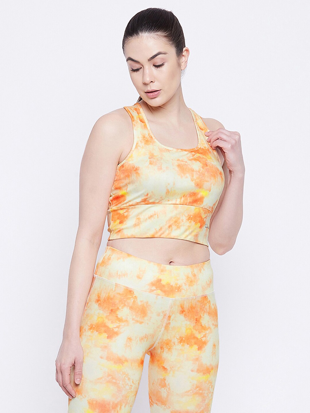 

Clovia Medium Impact Padded Non-Wired Full Coverage Racerback Sports Bra, Orange