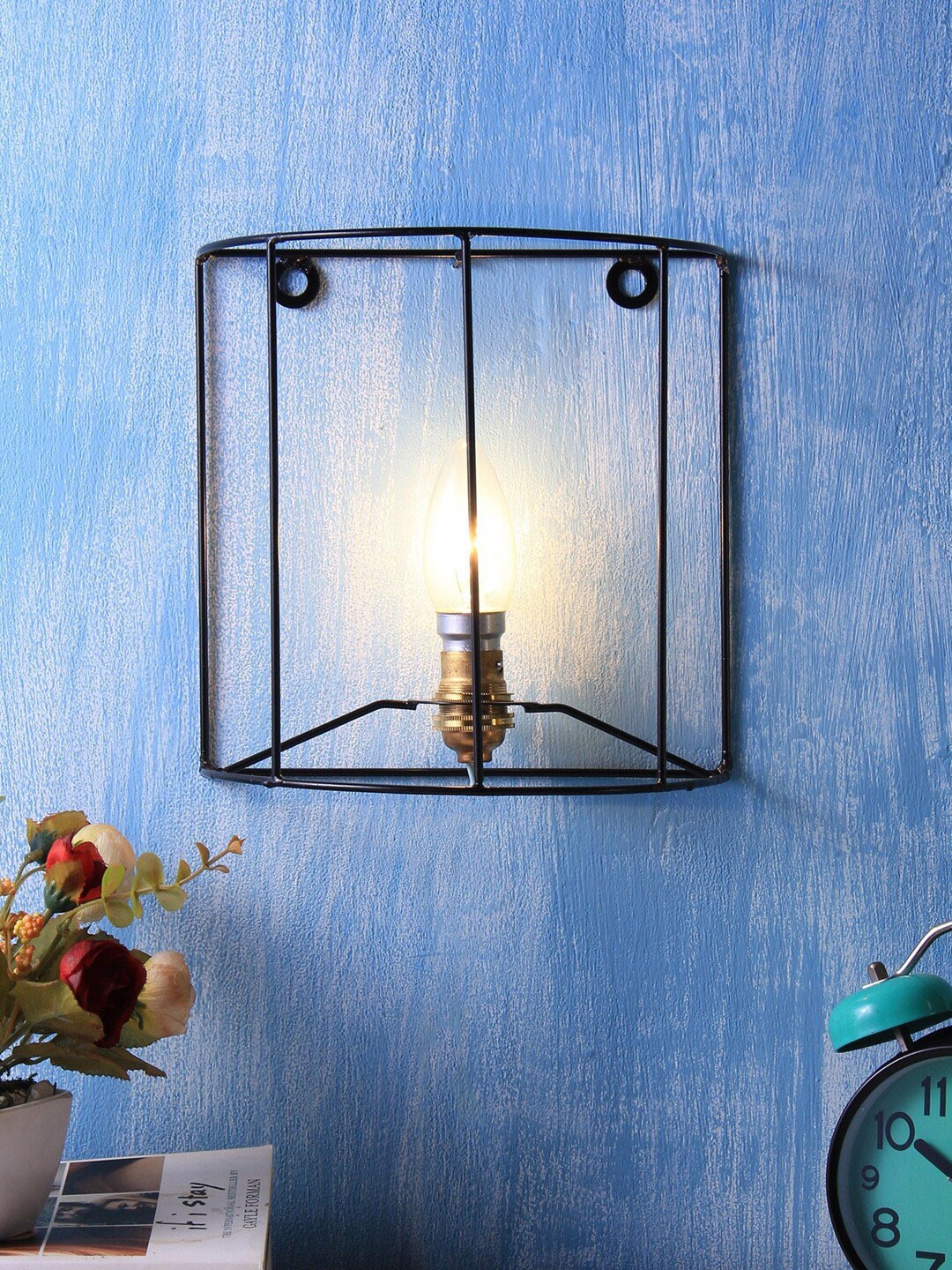 

Devansh Black Wrought Iron Wall Light Fixture