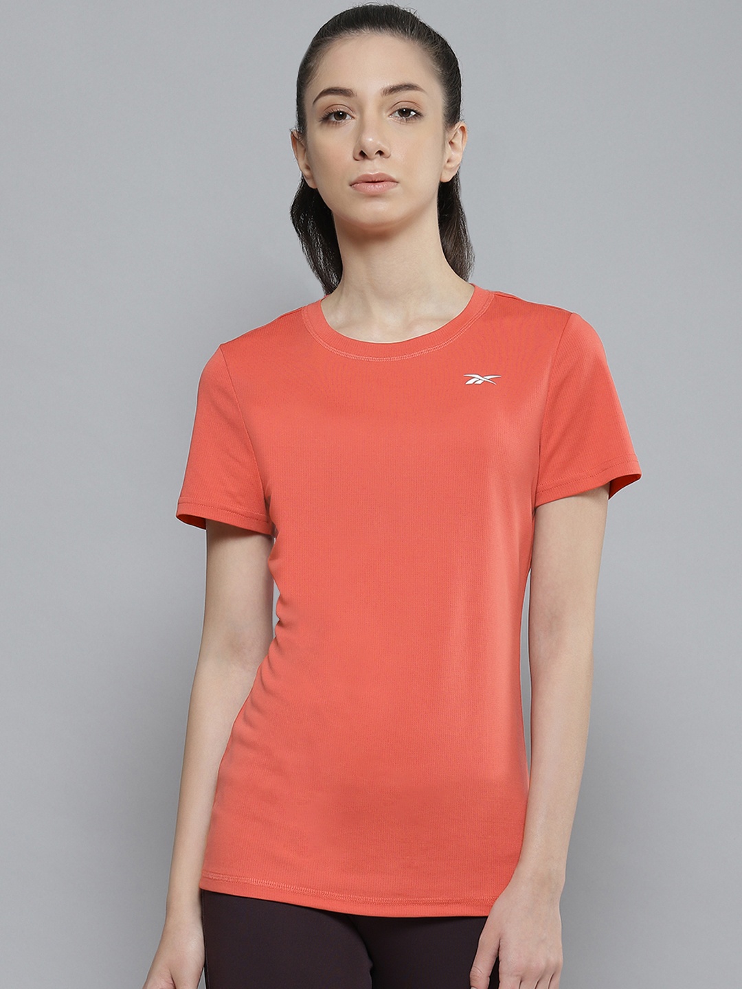 

Reebok Women Coral Red TE Solid Training T-shirt