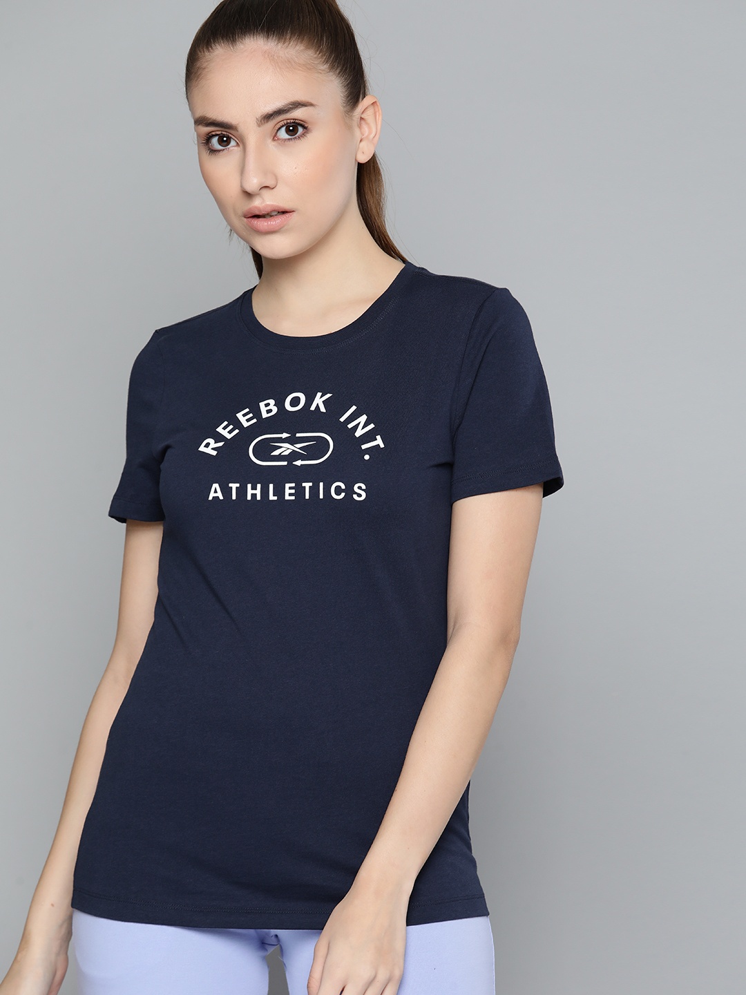 

Reebok Women Navy Blue & White W Prime Graphic Print Slim Fit Training Pure Cotton T-shirt