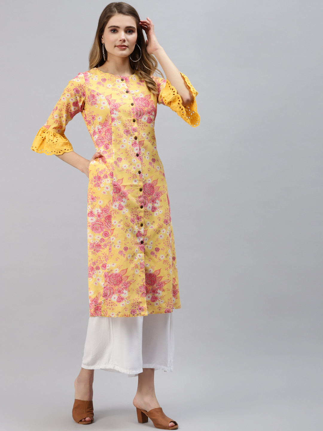 

Divena Women Yellow & Pink Floral Printed Bell Sleeves Cotton A-Line Kurta