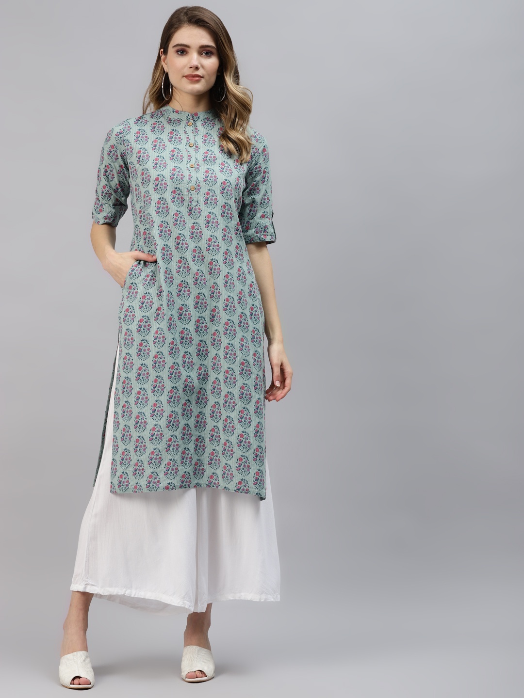 

Divena Women Turquoise Blue & Pink Ethnic Motifs Printed Cotton Kurta