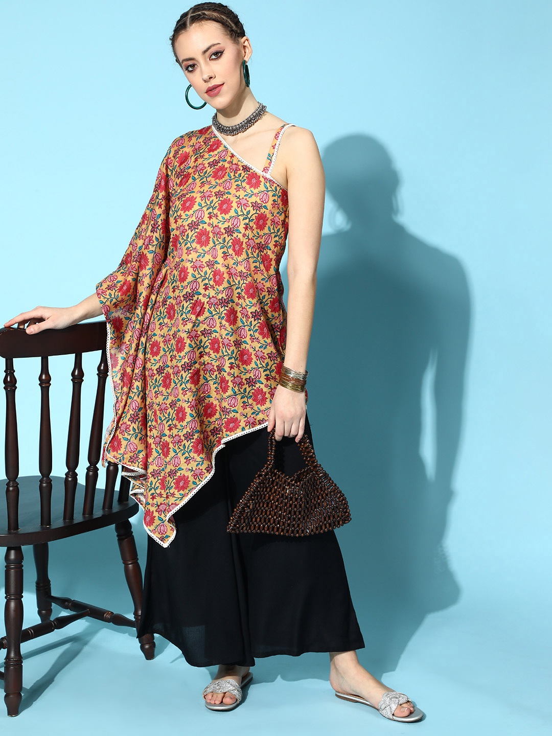 

InWeave Women Stylish Mustard Printed Top with Solid Palazzos