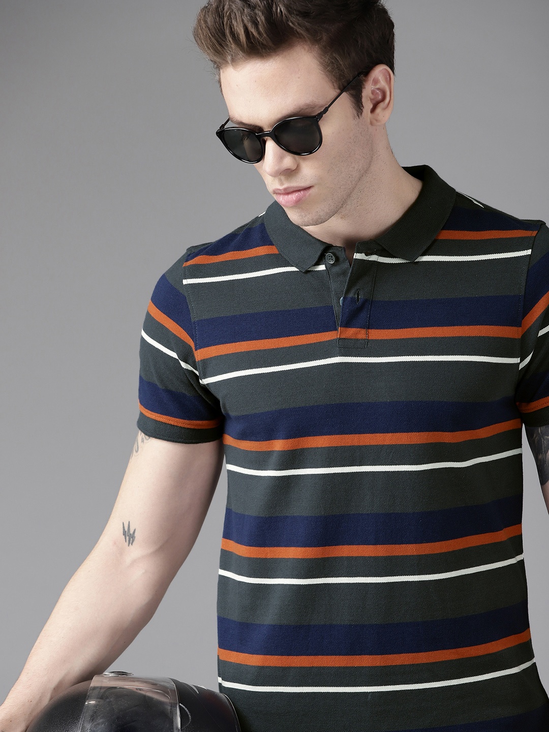 

Roadster Men Green & Navy Blue Pure Cotton Striped Polo Collar T-shirt