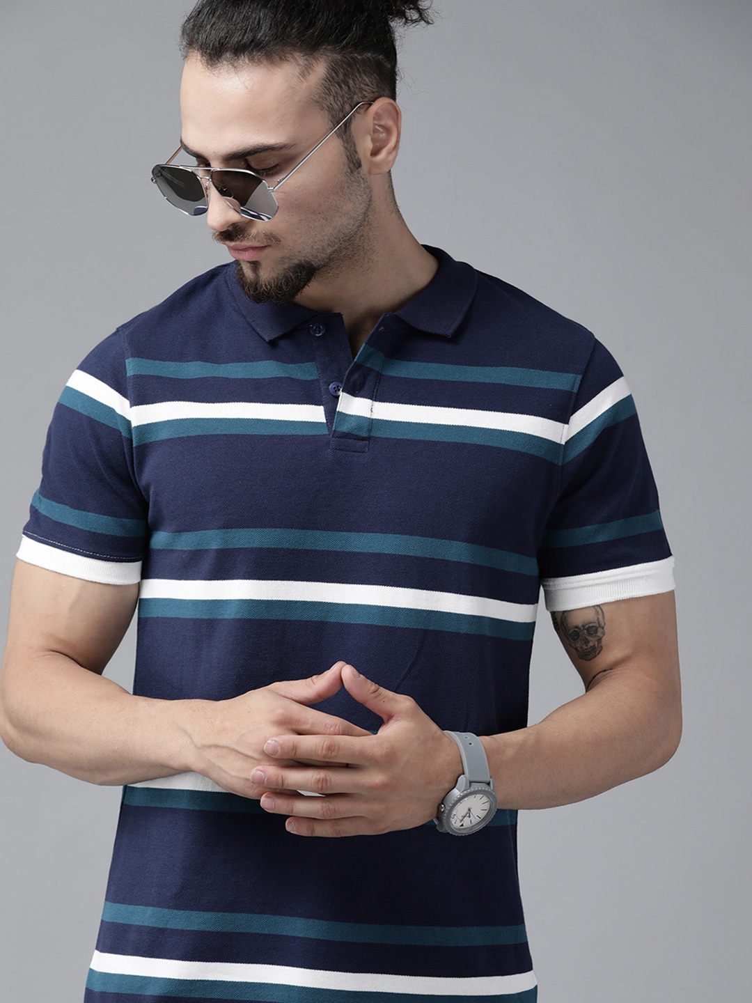 

Roadster Men Navy Blue & White Striped Polo Collar Pure Cotton T-shirt