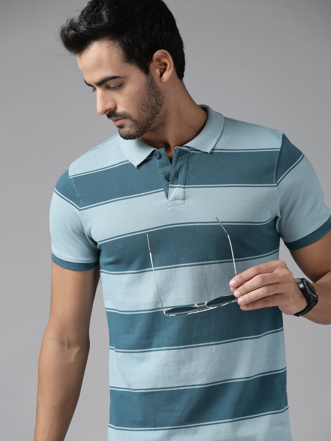 

Roadster Men Blue Striped Pure Cotton Polo Collar T-shirt