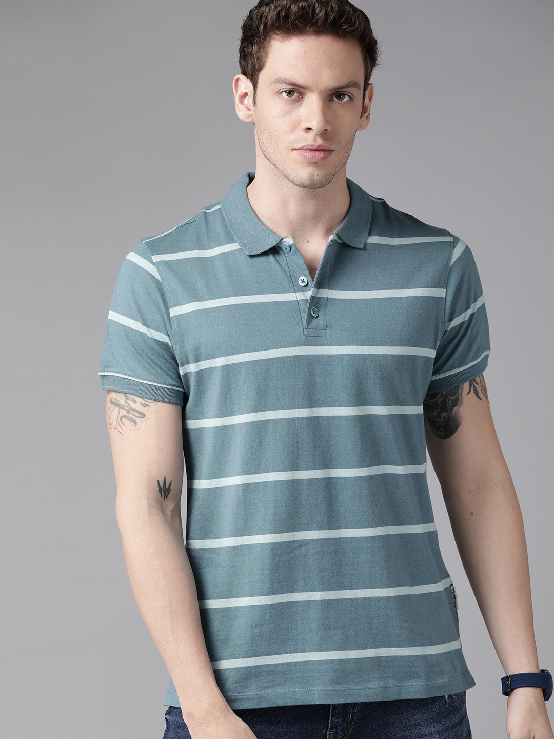 

Roadster Men Blue Striped Polo Collar Pure Cotton T-shirt