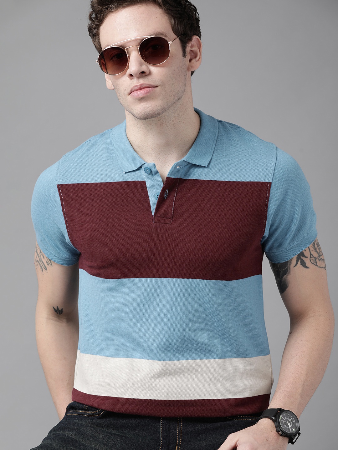 

Roadster Men Blue & Burgundy Pure Cotton Colourblocked Polo Collar T-shirt