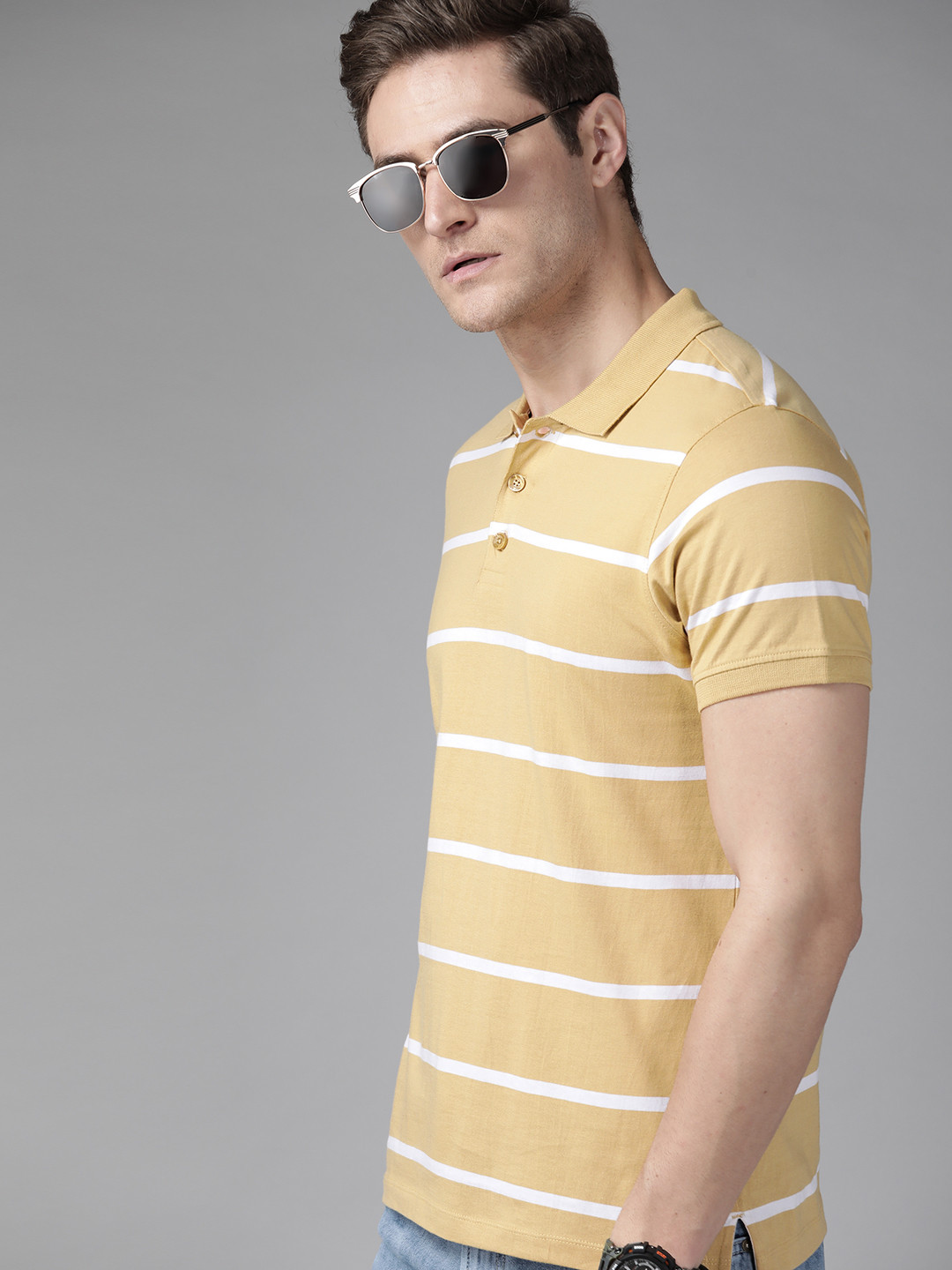 

The Roadster Lifestyle Co Men Khaki & White Pure Cotton Striped Polo Collar T-shirt
