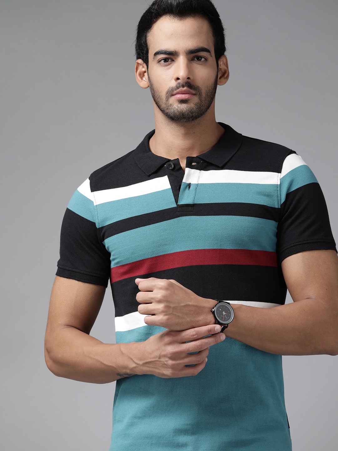 

Roadster Men Blue & Black Striped Polo Collar Pure Cotton T-shirt