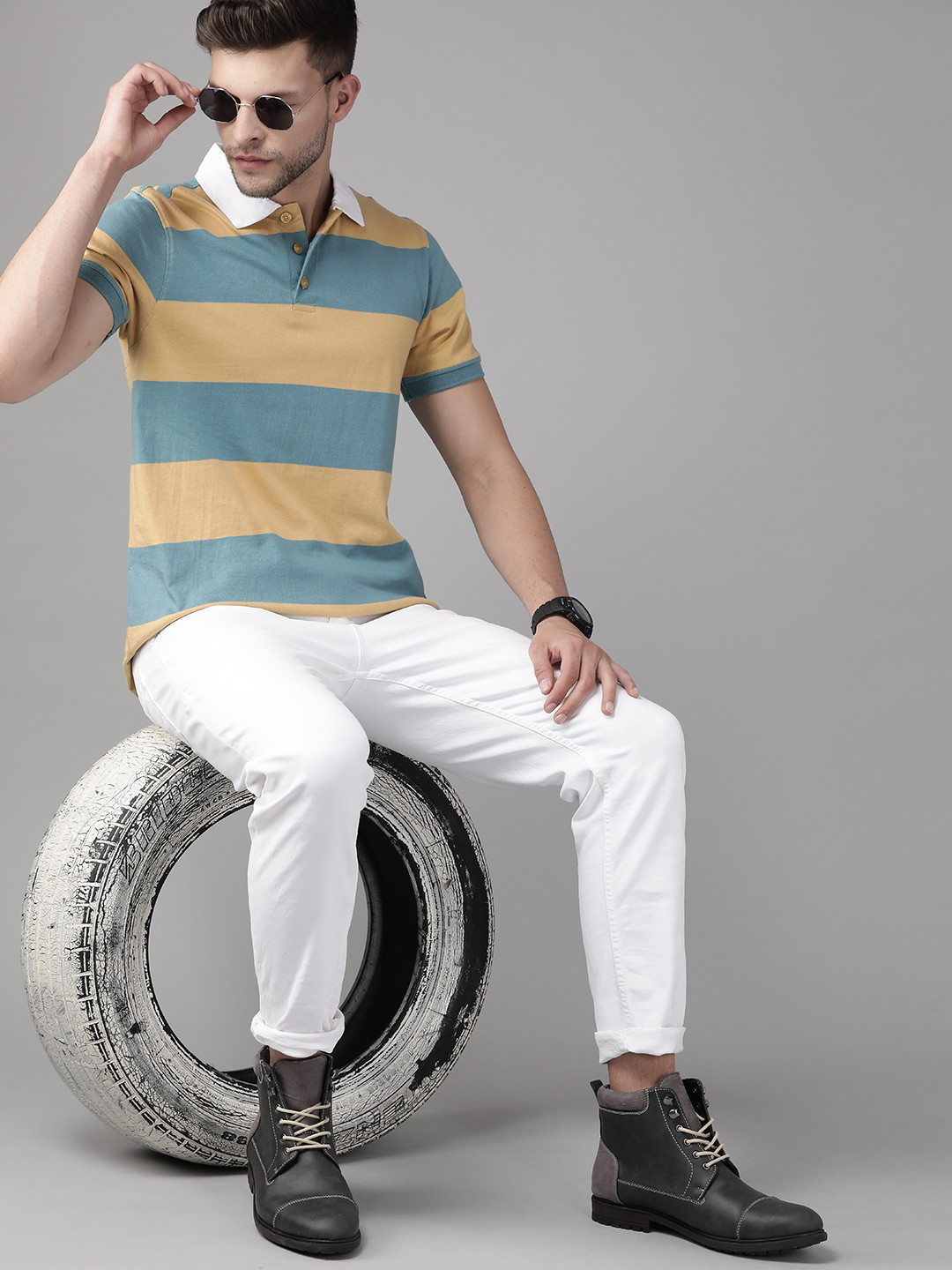 

Roadster Men Khaki & Blue Striped Pure Cotton Polo Collar T-shirt
