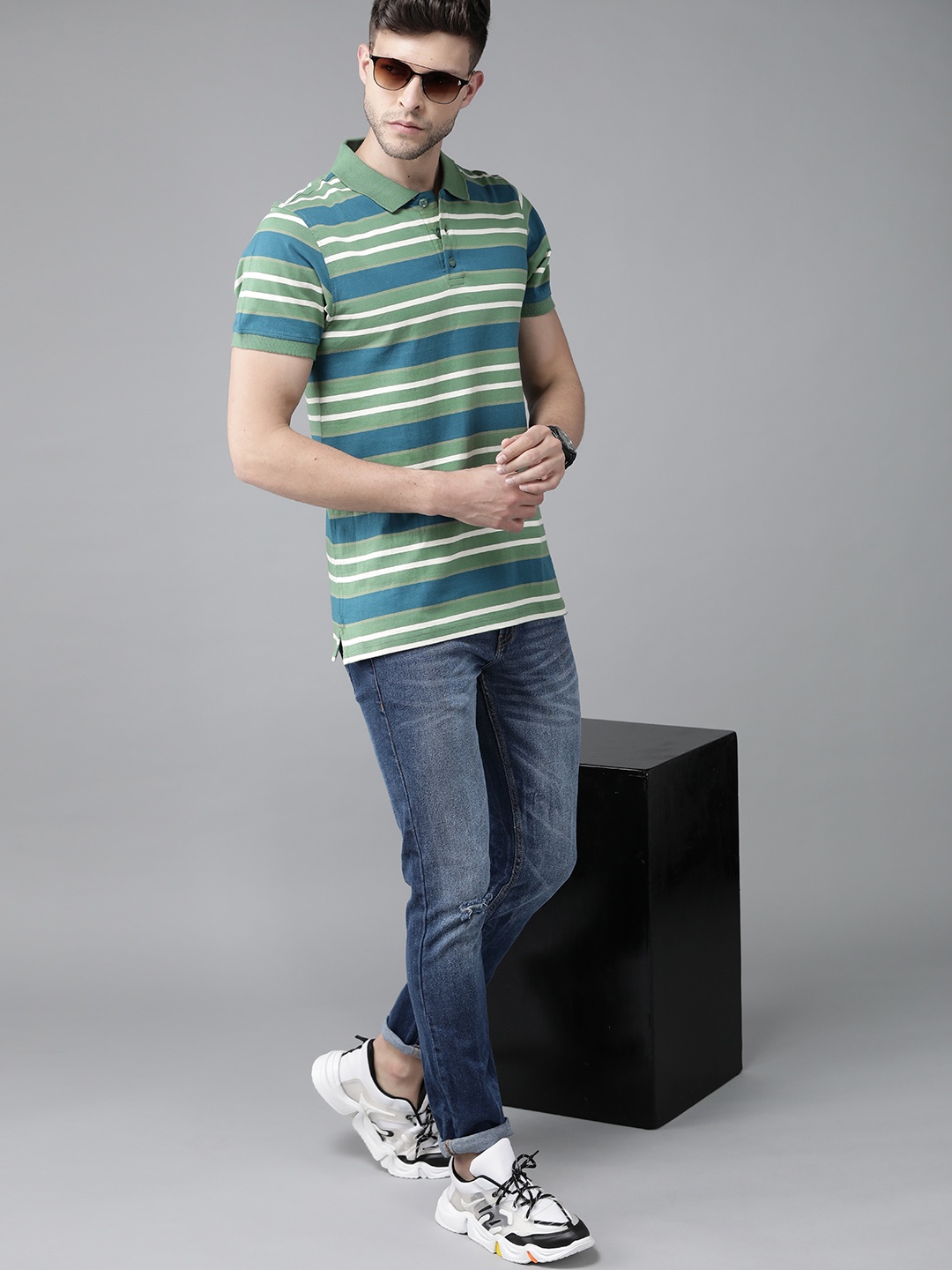 

Roadster Men Green & Teal Blue Striped Polo Collar Pure Cotton T-shirt