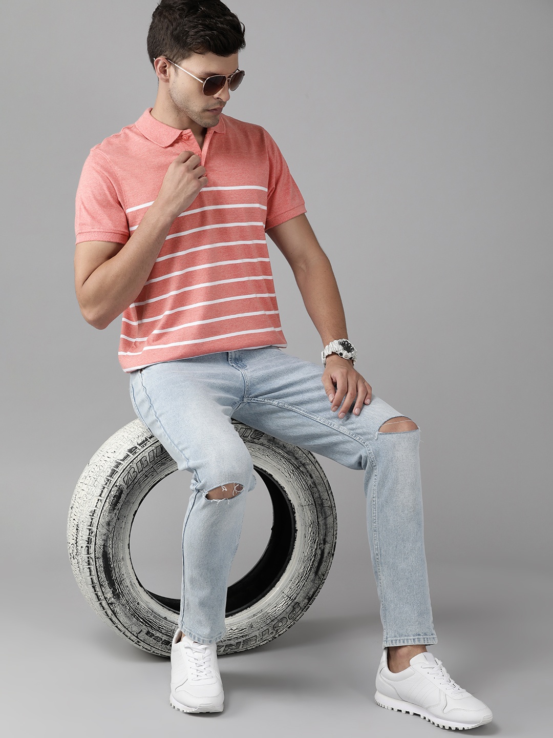 

Roadster Men Coral Red Melange & White Striped Polo Collar T-shirt