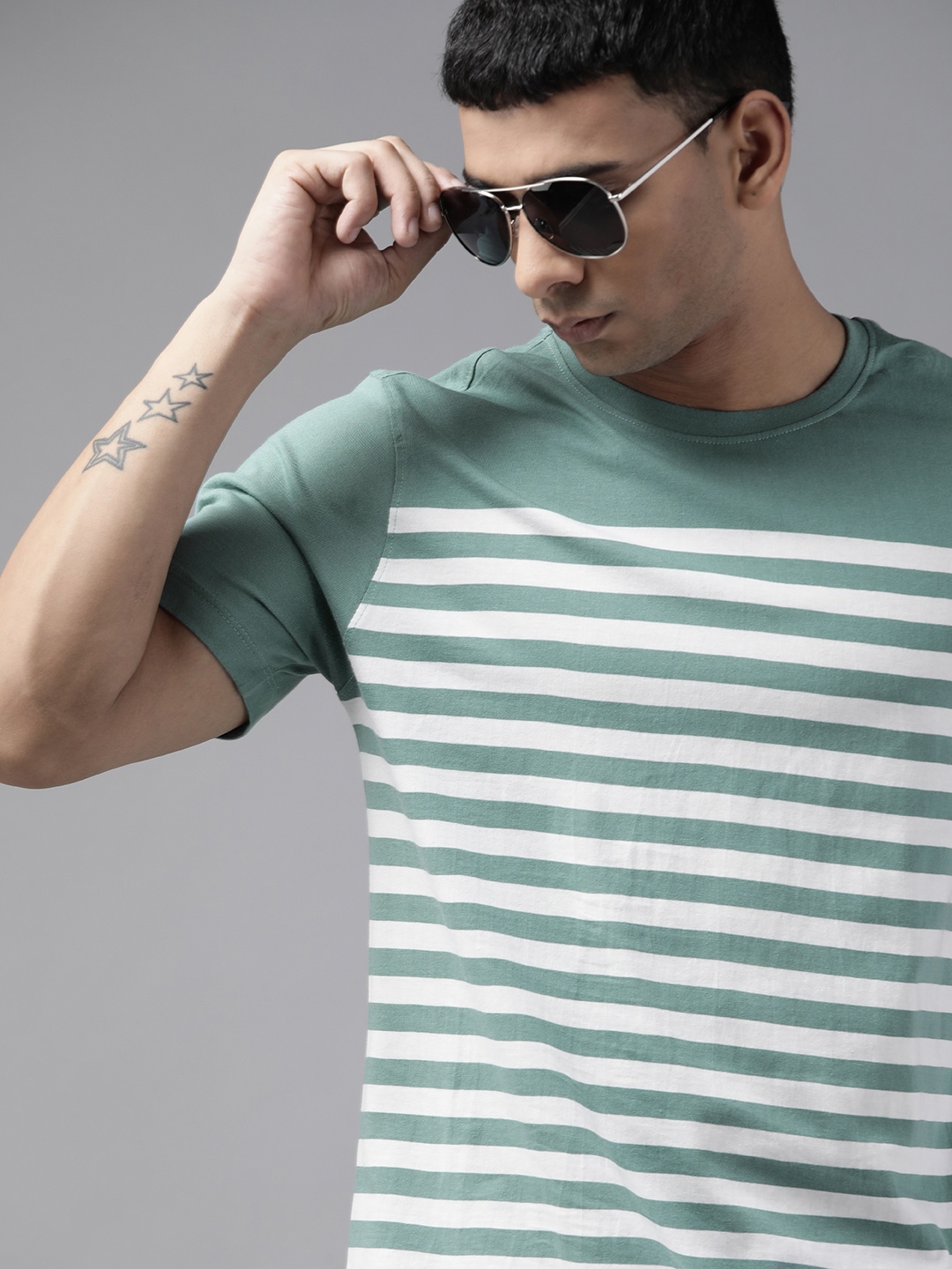 

Roadster Men Blue & Off White Striped Pure Cotton T-shirt