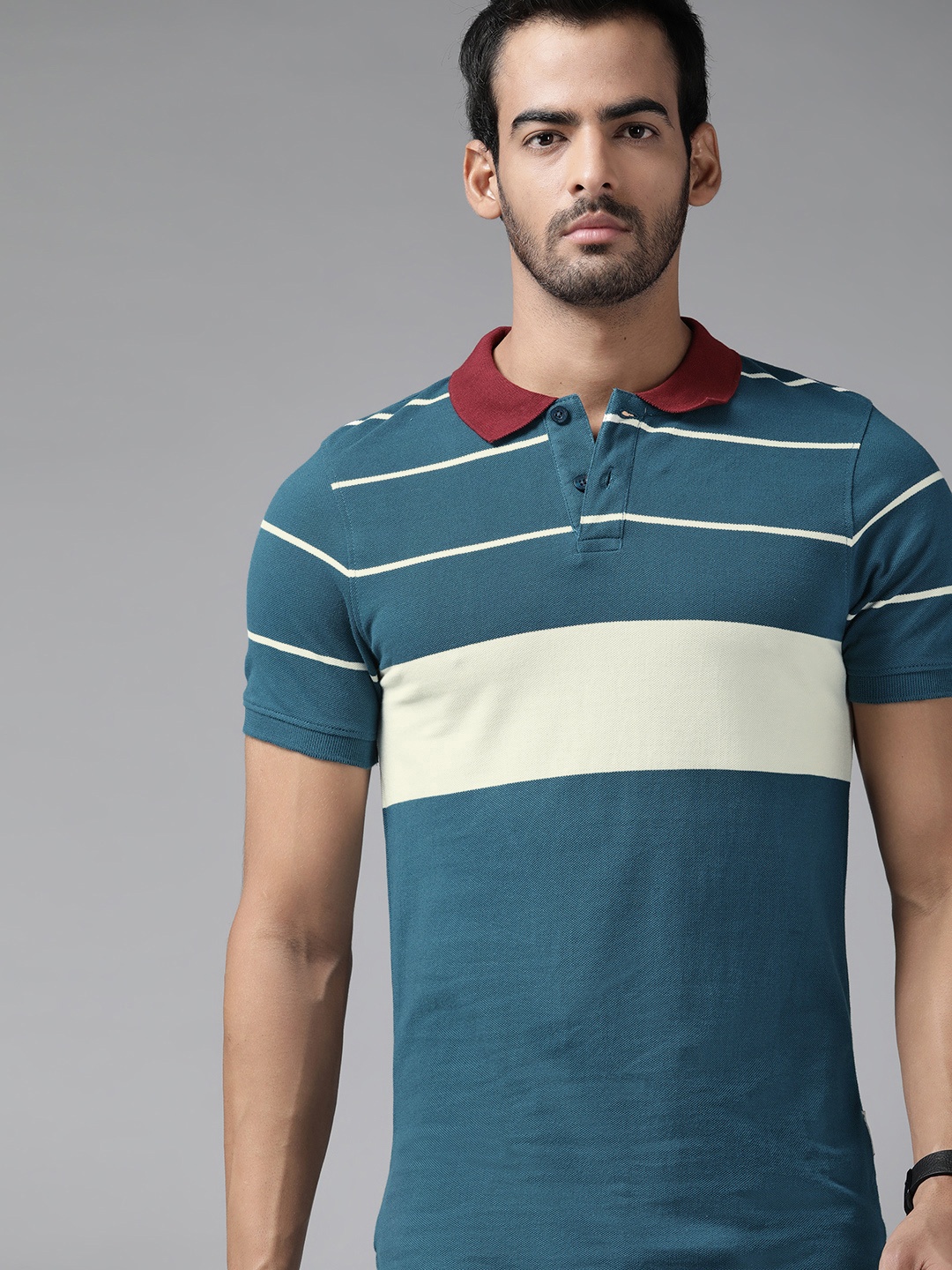 

Roadster Men Teal Blue & White Striped Polo Collar Pure Cotton T-shirt
