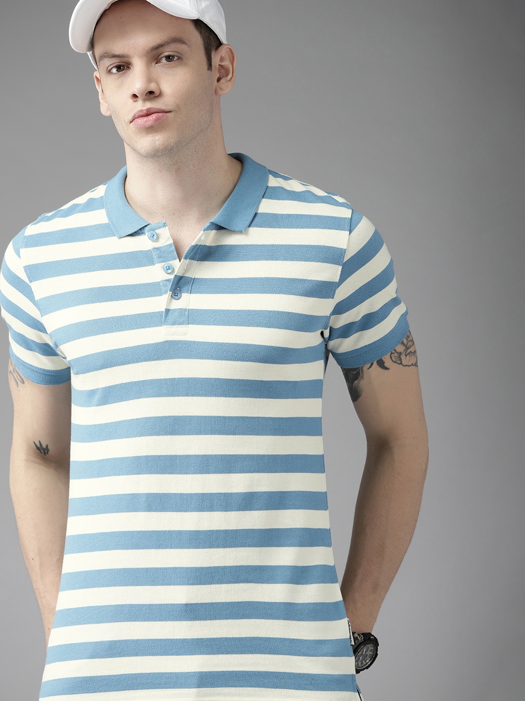

Roadster Men Blue & Off White Pure Cotton Striped Polo Collar T-shirt