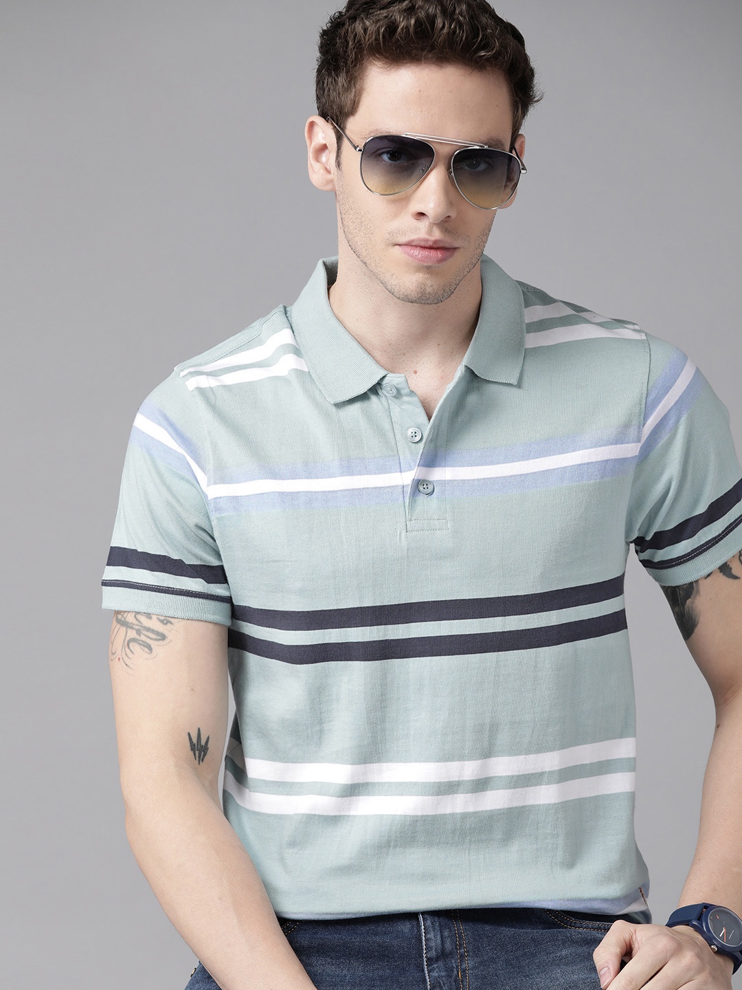 

Roadster Men Blue & White Striped Polo Collar Pure Cotton T-shirt