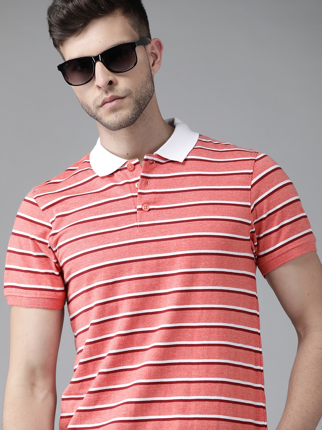 

Roadster Men Coral Pink & White Striped Polo Collar T-shirt