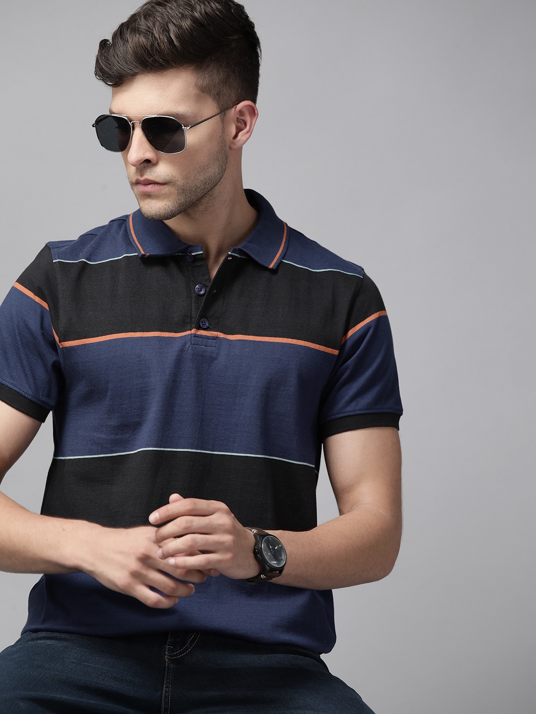 

Roadster Men Navy Blue & Black Striped Polo Collar Pure Cotton T-shirt