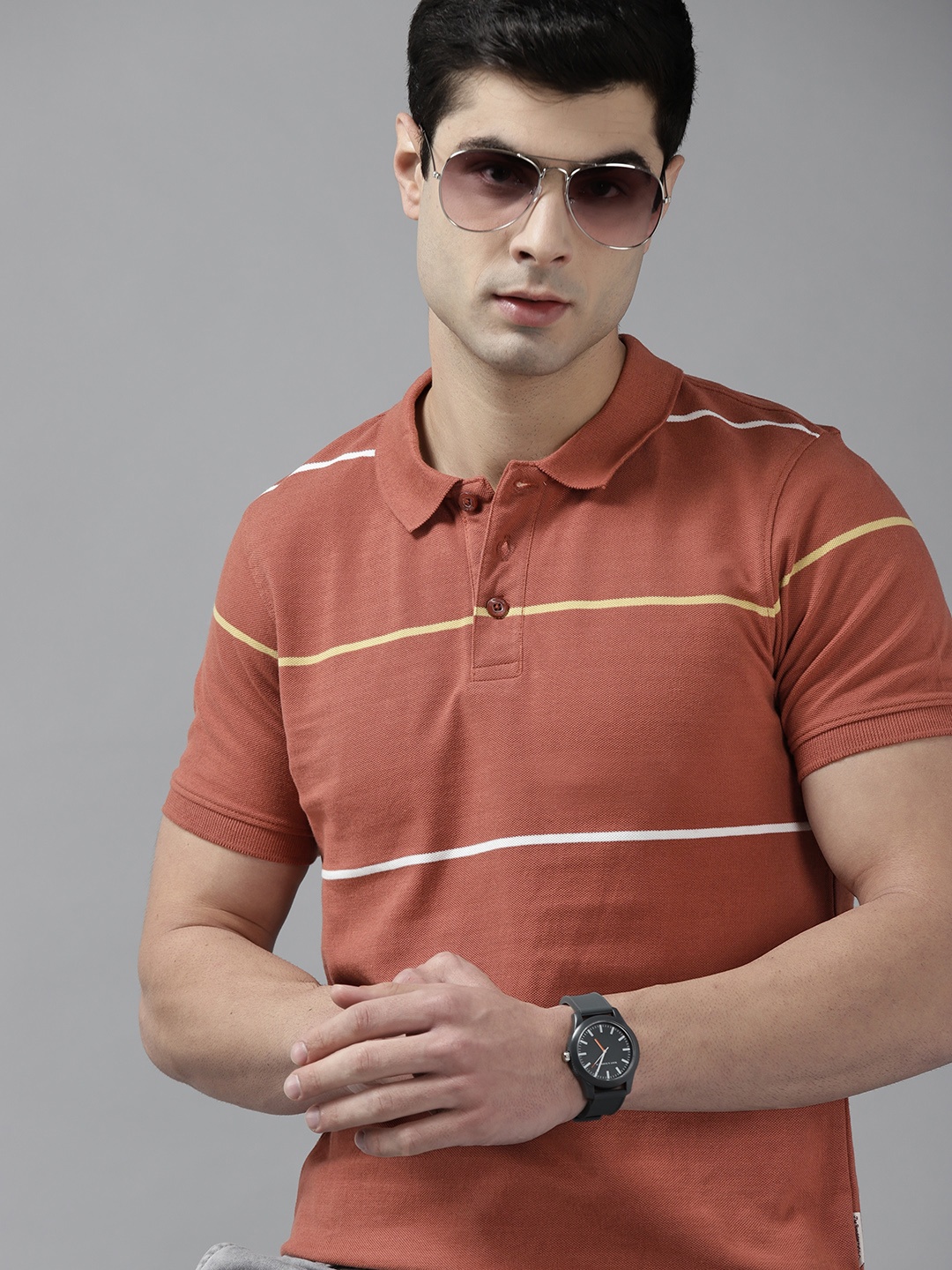 

Roadster Men Rust Brown Pure Cotton Striped Polo Collar T-shirt