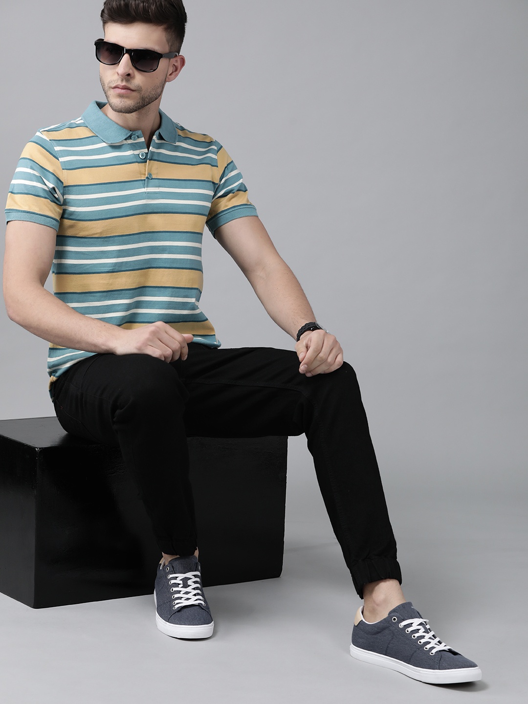 

Roadster Men Blue & Beige Striped Polo Collar Pure Cotton T-shirt