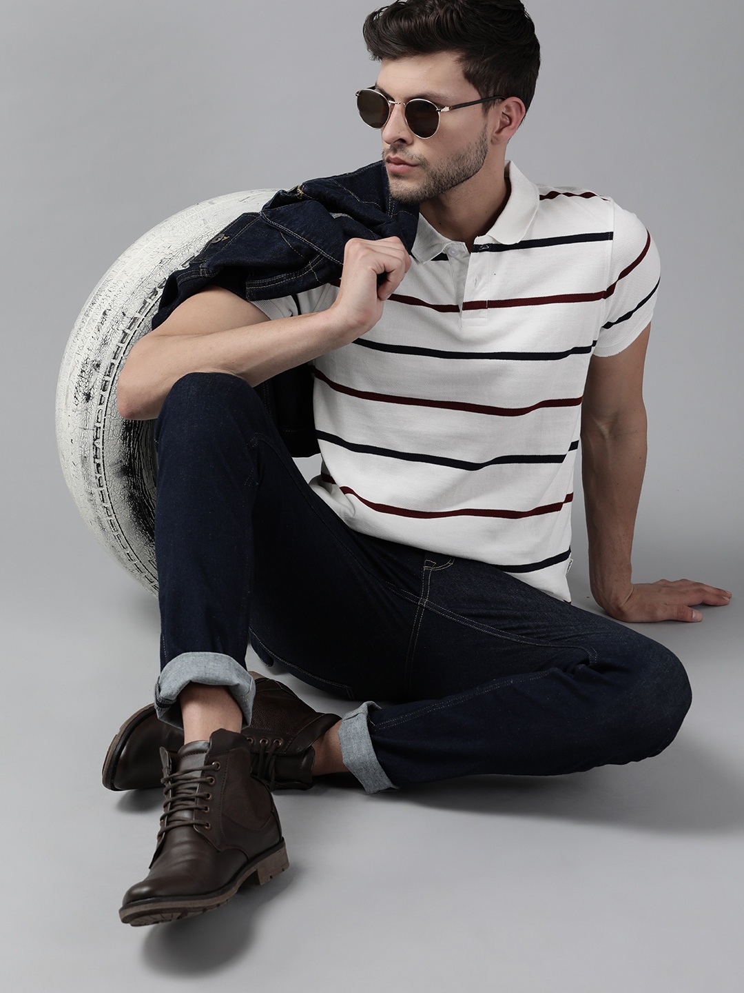 

Roadster Men White & Navy Blue Pure Cotton Striped Polo Collar T-shirt