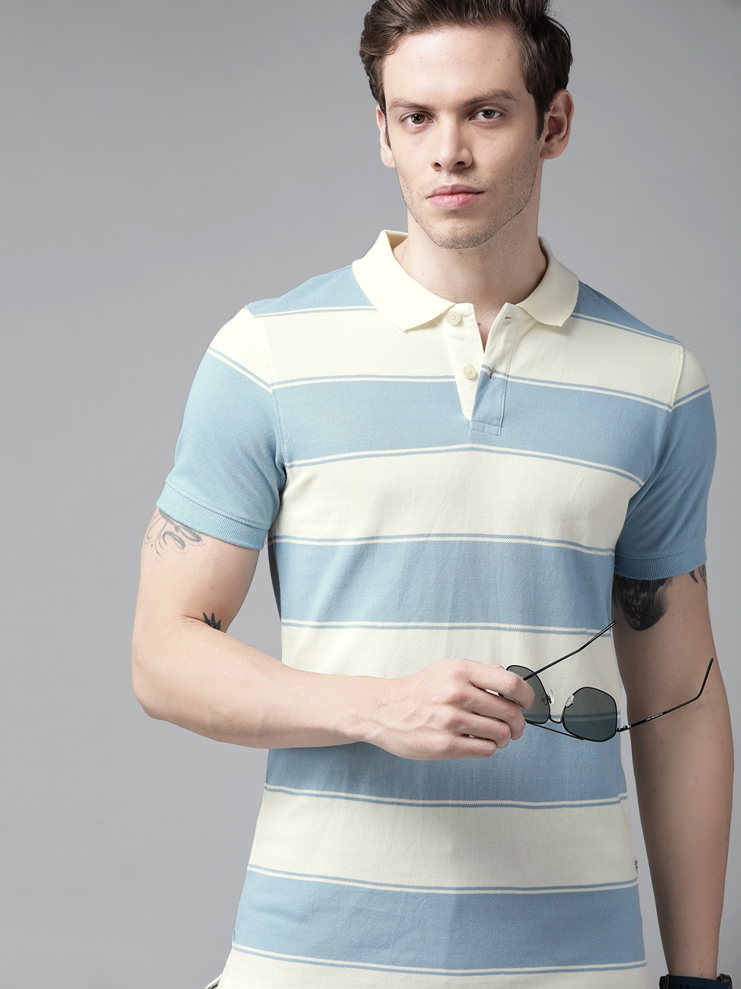 

Roadster Men Blue & Cream-Coloured Striped Polo Collar Pure Cotton T-shirt