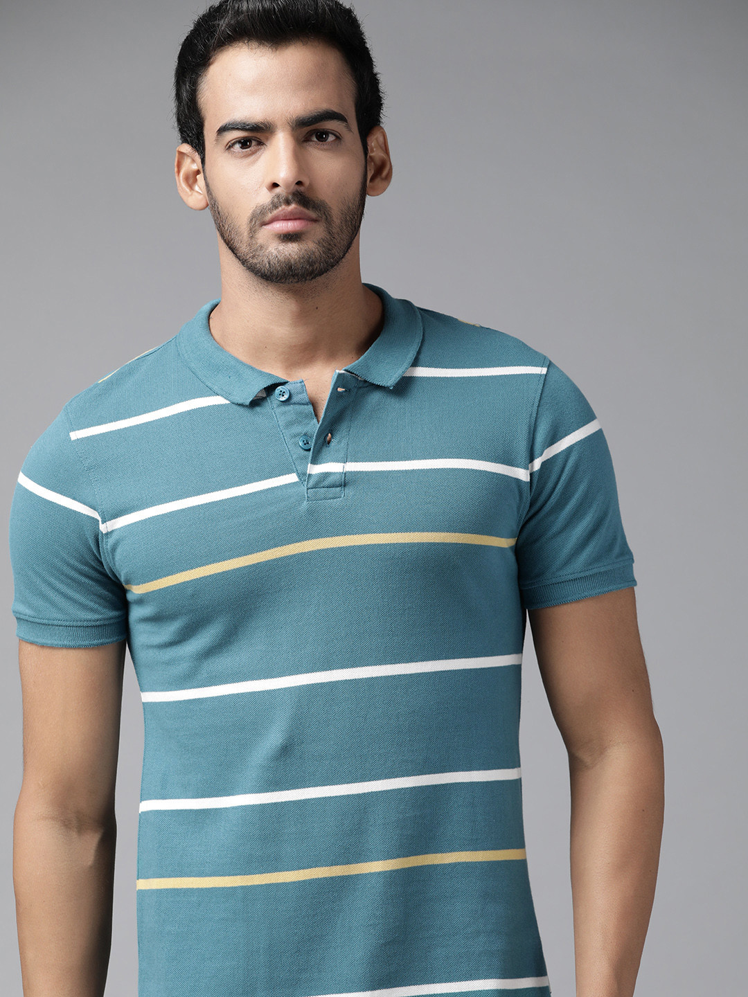 

Roadster Men Teal Blue & White Pure Cotton Striped Polo Collar T-shirt