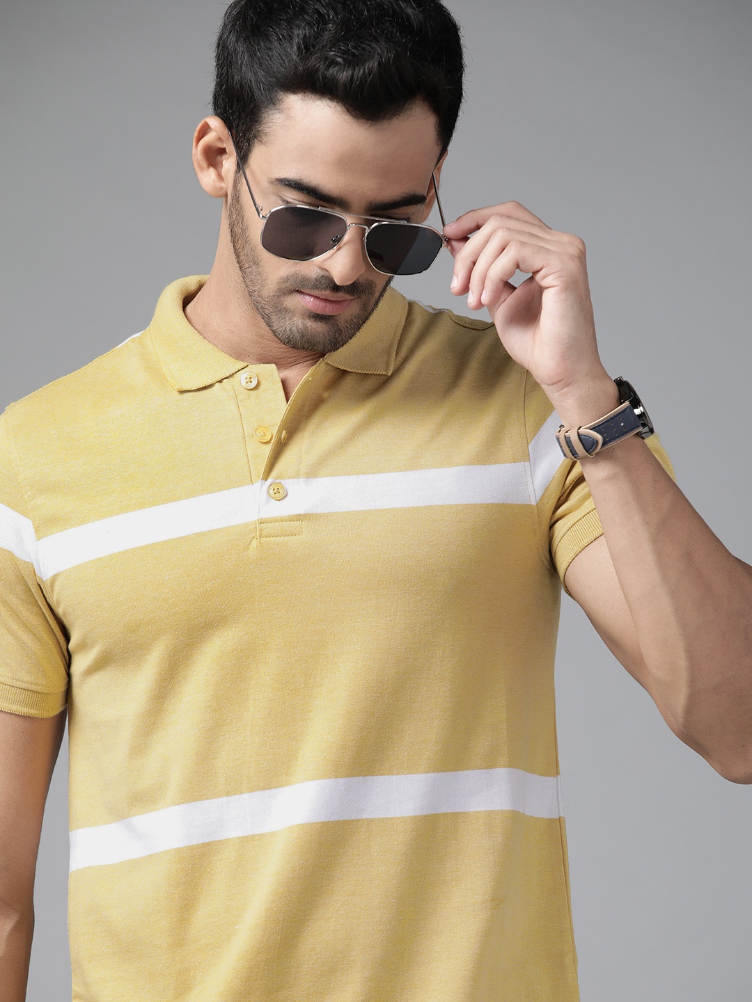 

Roadster Men Mustard Yellow & White Striped Polo Collar T-shirt