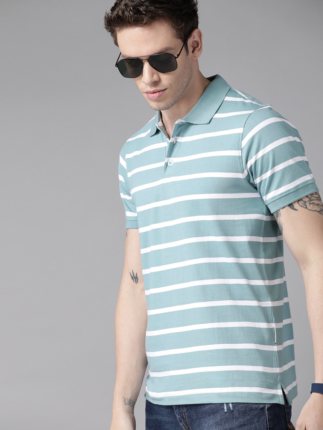 

Roadster Men Blue & White Striped Polo Collar Pure Cotton T-shirt