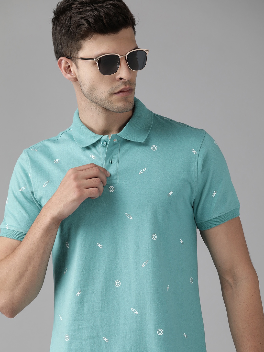 

Roadster Men Sea Green & White Biker Printed Polo Collar Pure Cotton T-shirt