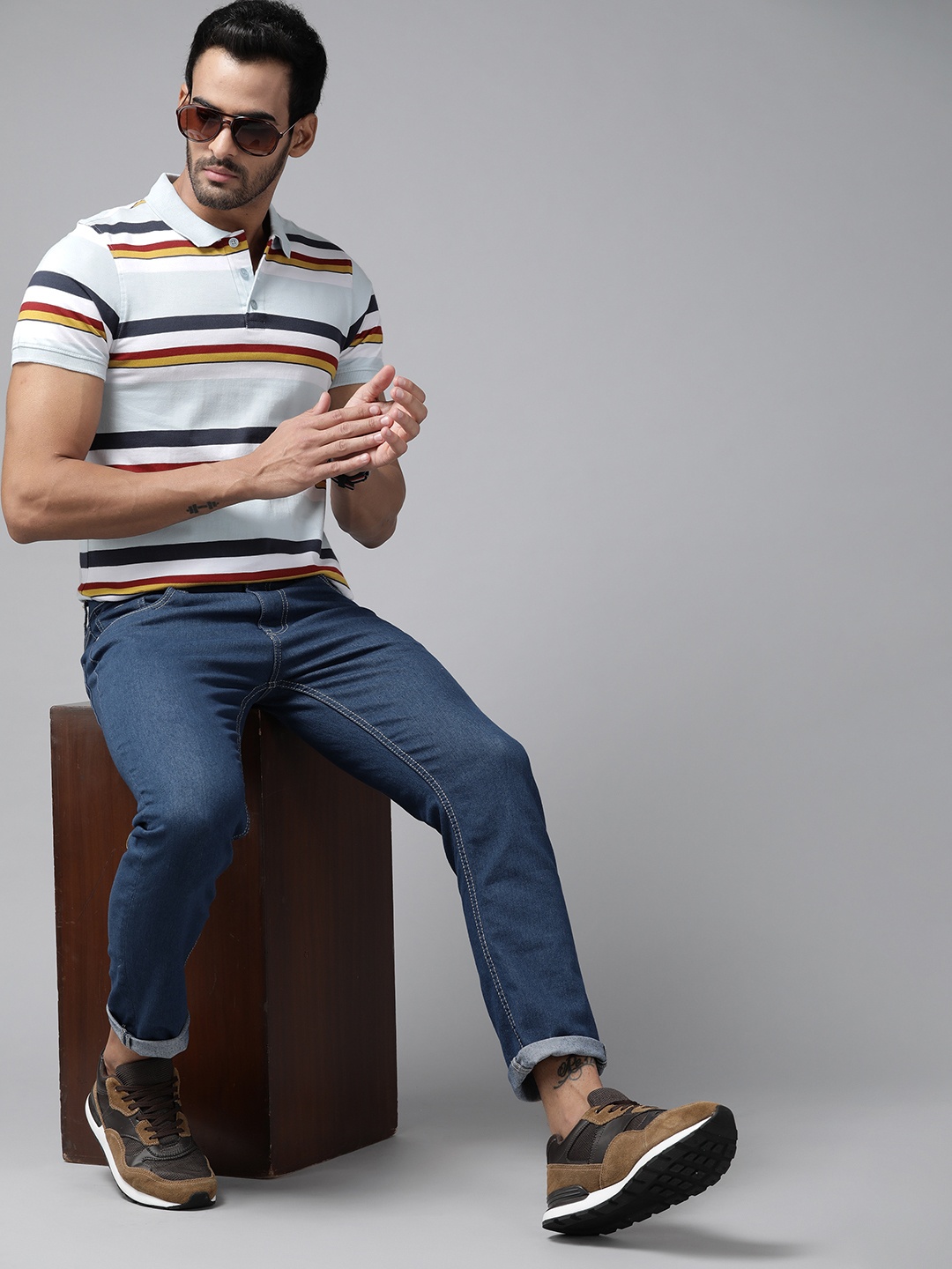 

Roadster Men Blue & White Pure Cotton Striped Polo Collar T-shirt
