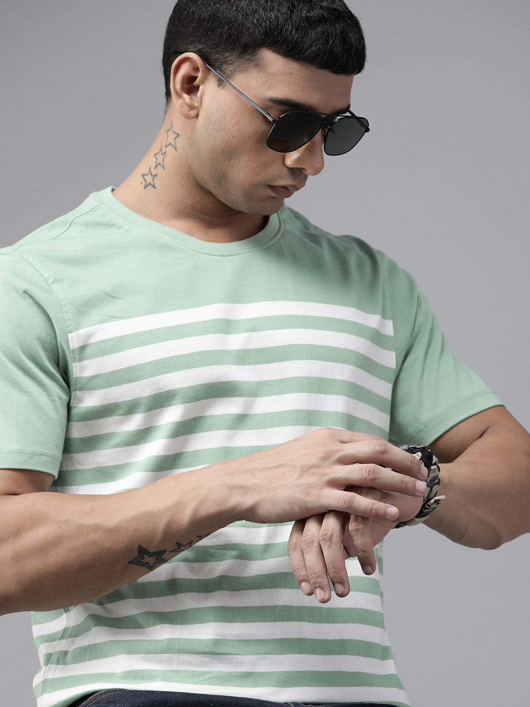 

Roadster Men Green & Off White Striped Pure Cotton T-shirt