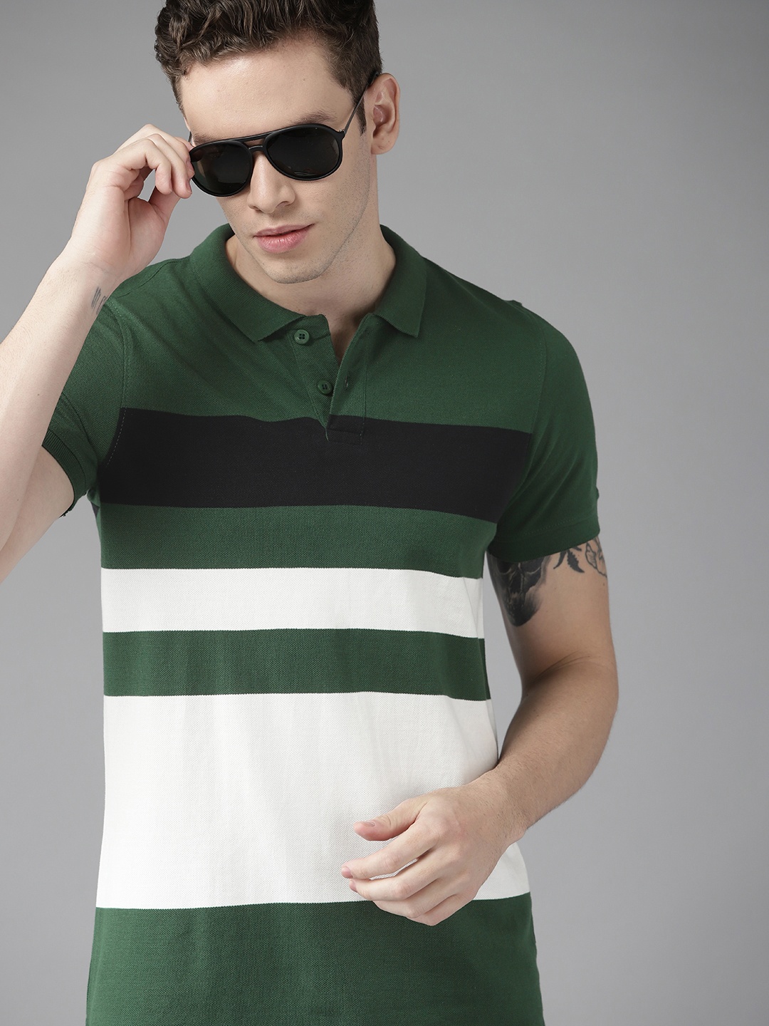 

Roadster Men Green & White Pure Cotton Striped Polo Collar T-shirt