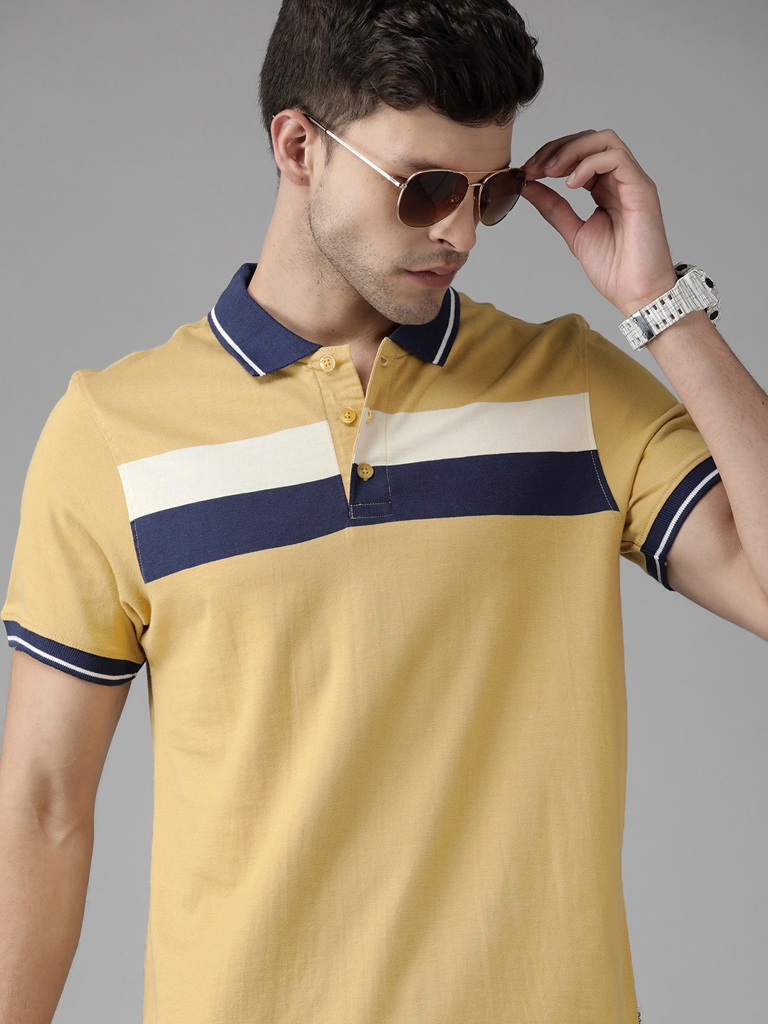 

Roadster Men Mustard Yellow & Navy Blue Striped Polo Collar Pure Cotton T-shirt