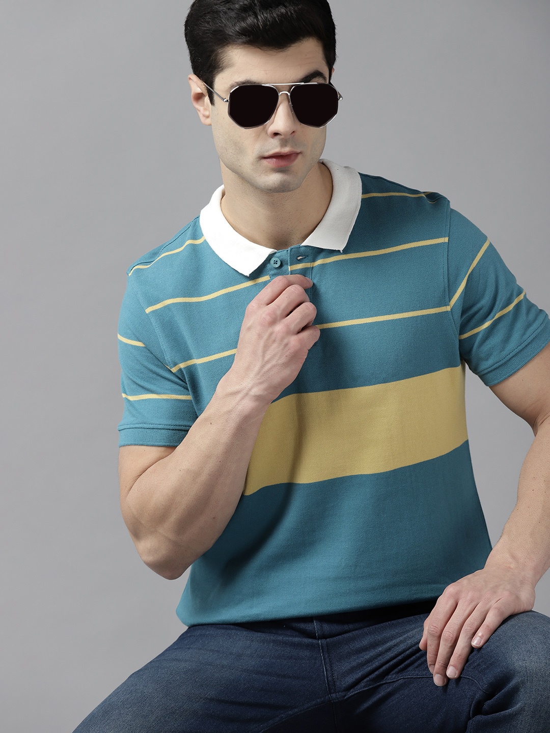 

Roadster Men Blue & Yellow Striped Polo Collar Pure Cotton T-shirt