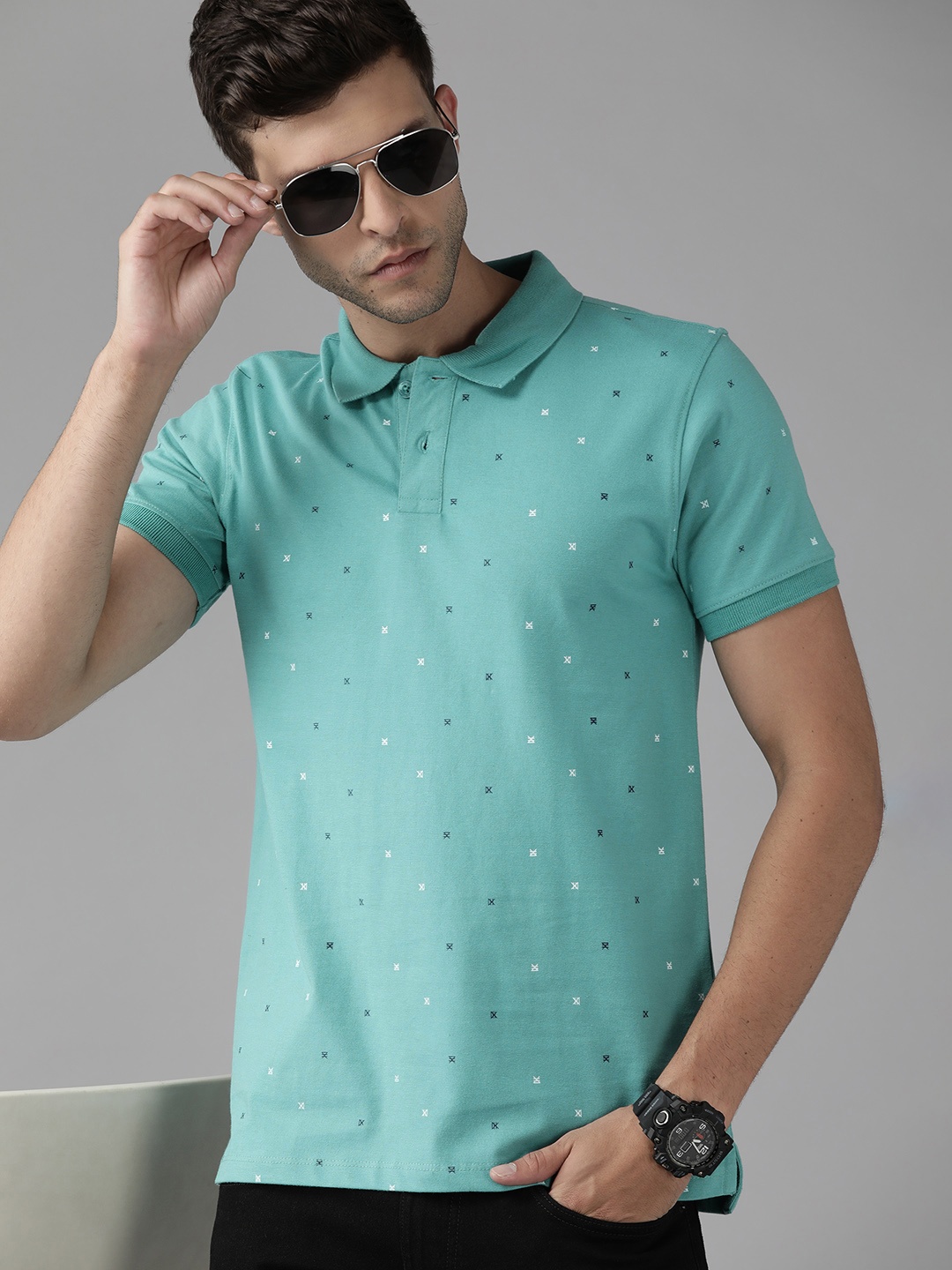 

Roadster Men Sea Green & White Printed Polo Collar Pure Cotton T-shirt
