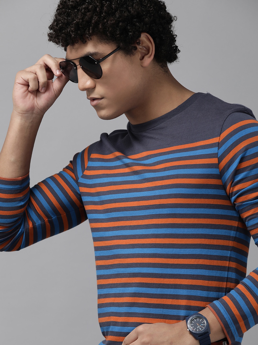 

The Roadster Lifestyle Co. Men Navy Blue & Rust Orange Striped Pure Cotton T-shirt