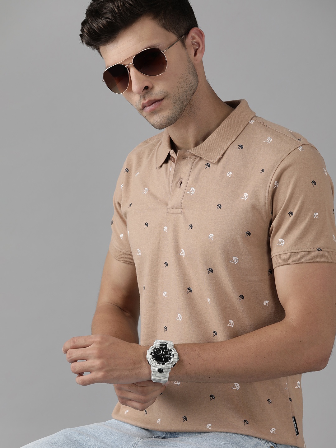 

Roadster Men Beige Printed Polo Collar Pure Cotton T-shirt