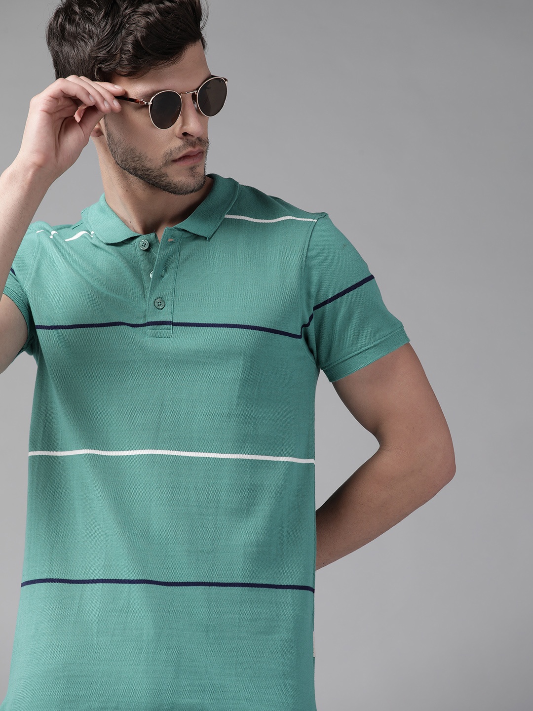 

Roadster Men Green & White Pure Cotton Striped Polo Collar T-shirt