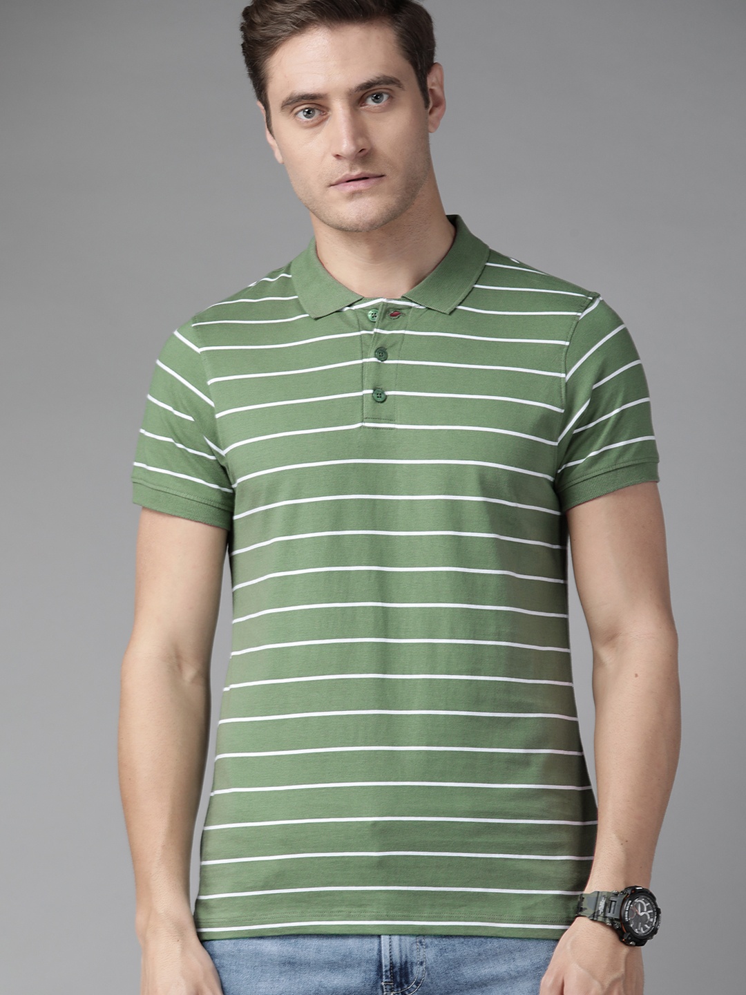 

The Roadster Lifestyle Co Men Green & White Pure Cotton Striped Polo Collar T-shirt