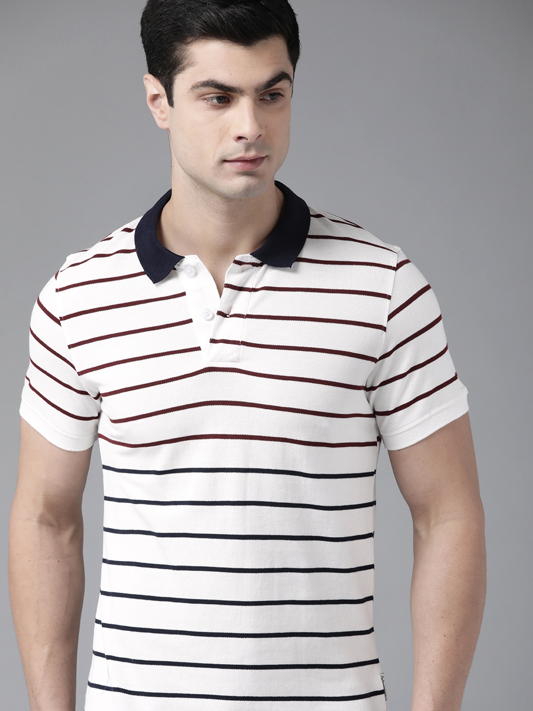 

Roadster Men White & Navy Blue Pure Cotton Striped Polo Collar T-shirt