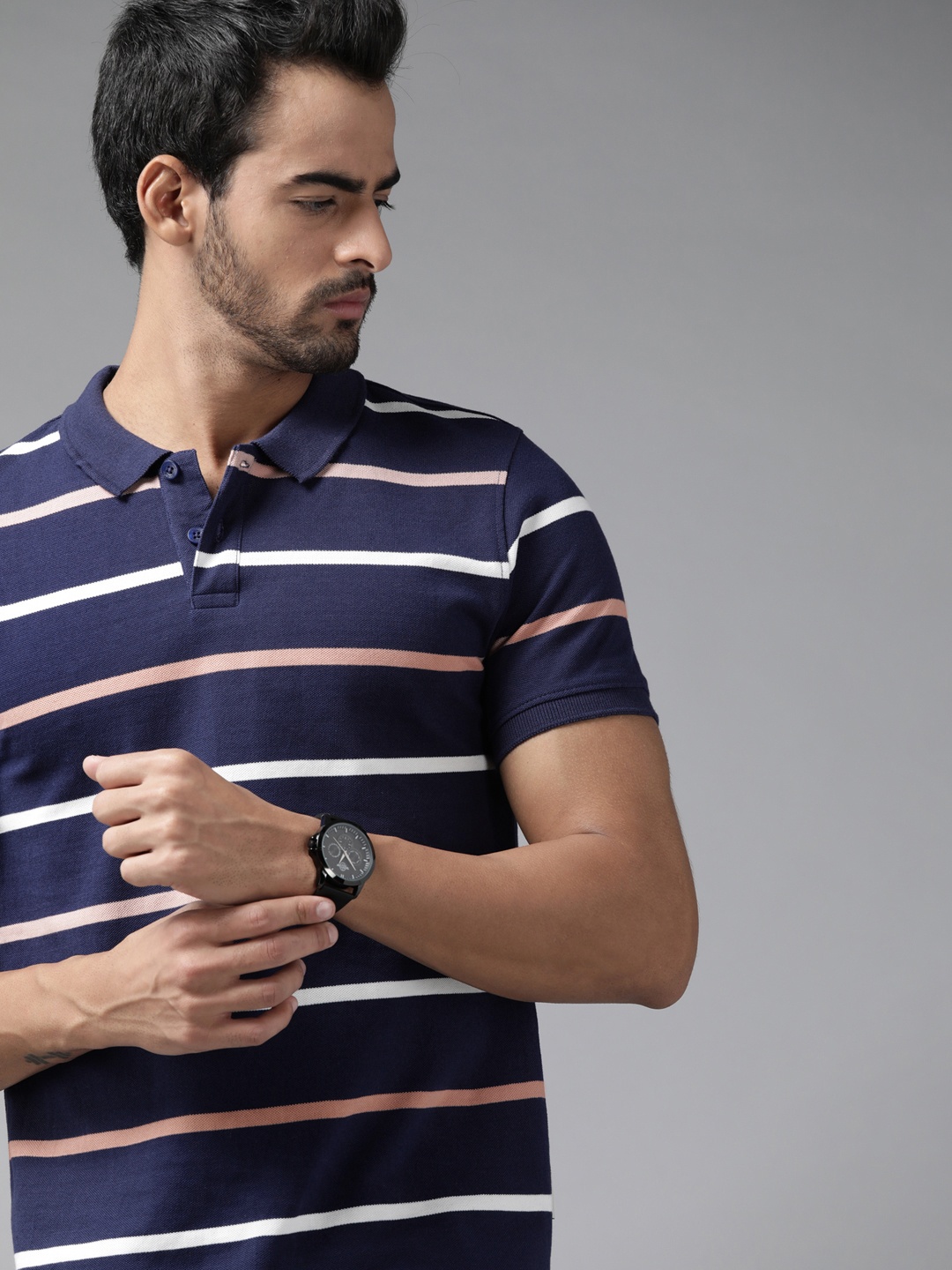 

Roadster Men Navy Blue & Pink Striped Polo Collar Pure Cotton T-shirt